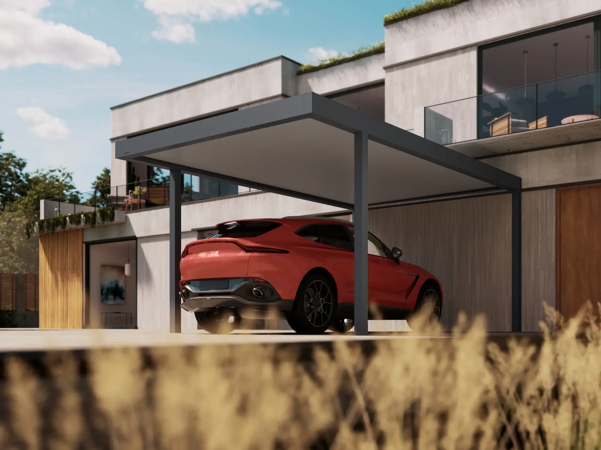 Carport mit festem Dach und klarer Architektur neben einem Wohnhaus